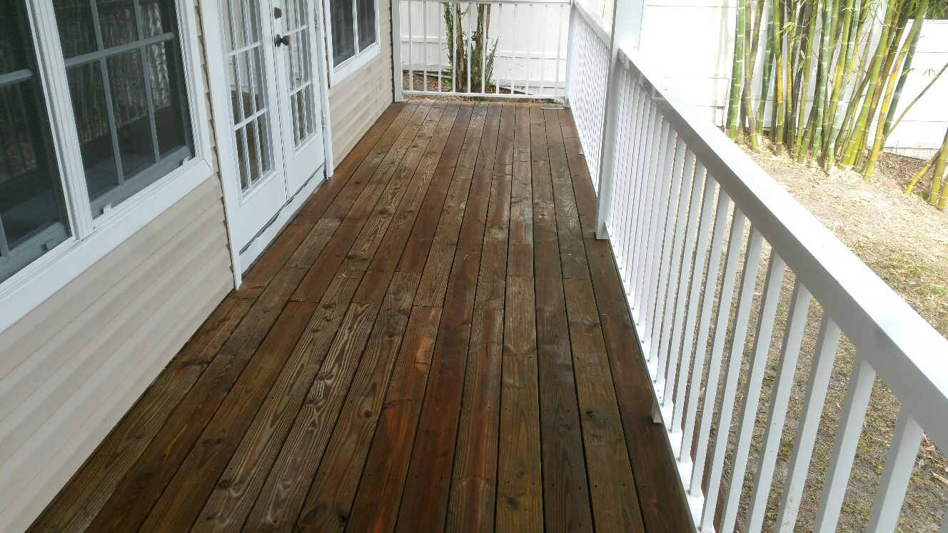 Pressure washing wooden deck after picture